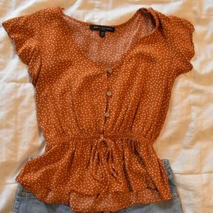 Orange polka dot cropped shirt